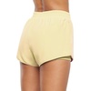 image:imageMarika Womens Lillian Asymmetrical Wrap Active SkortWax Yellow